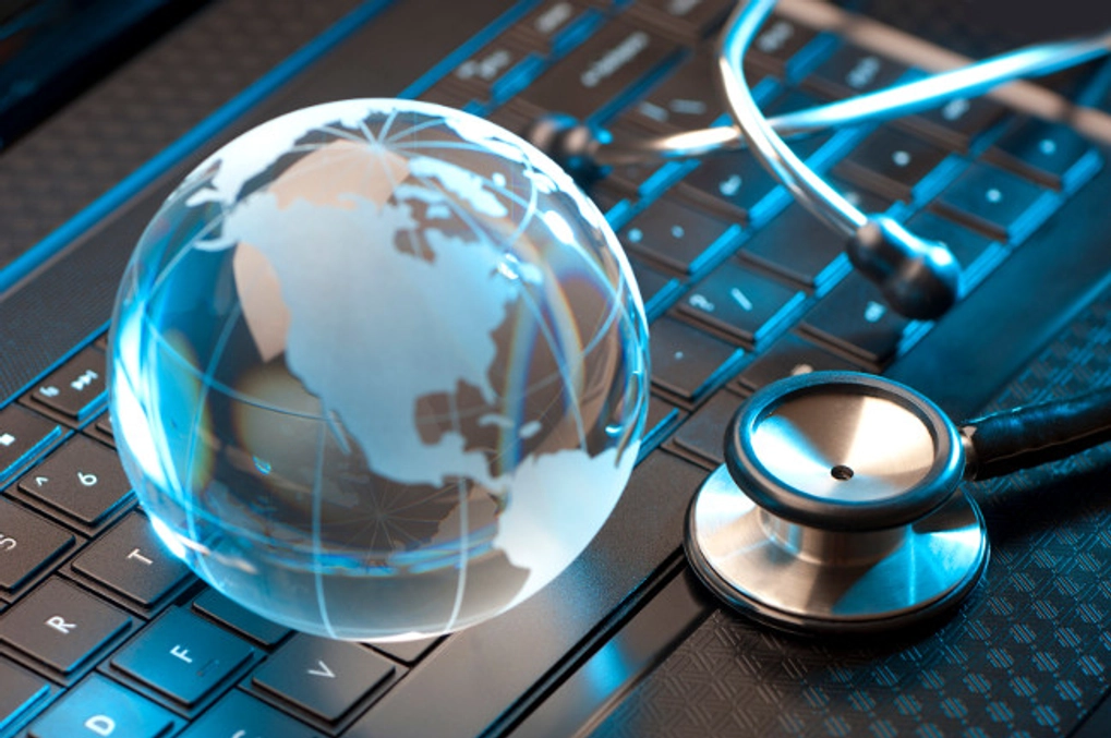 the globe, computer keyboards and stethoscope