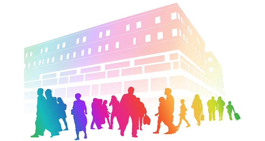 rainbow silhouettes of people in front of building