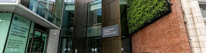 A photo of the front of the Trinity Business School