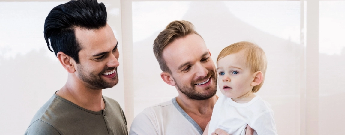 Two fathers and their child