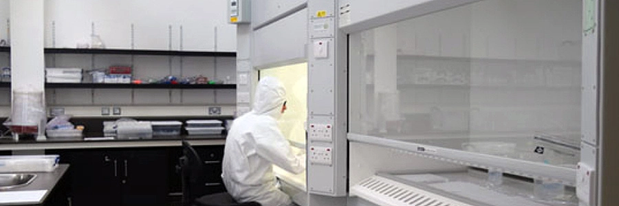 Student in the clean laboratory, Trinity College Dublin.