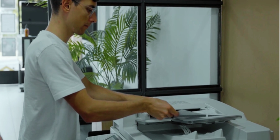 A person using a printer