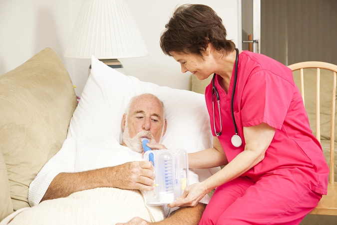 patient and doctor in pink - beside image