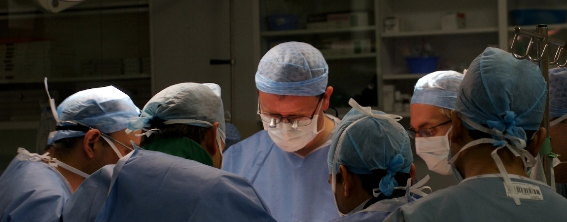 Surgery team operating on a patient