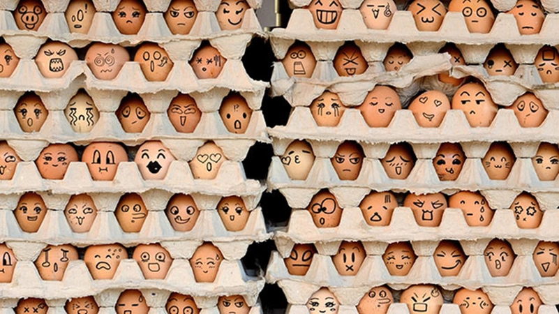 Diversity represent through faces drawn on eggs