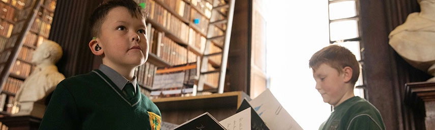 two boys in library
