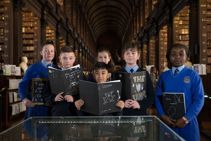 Children holding books