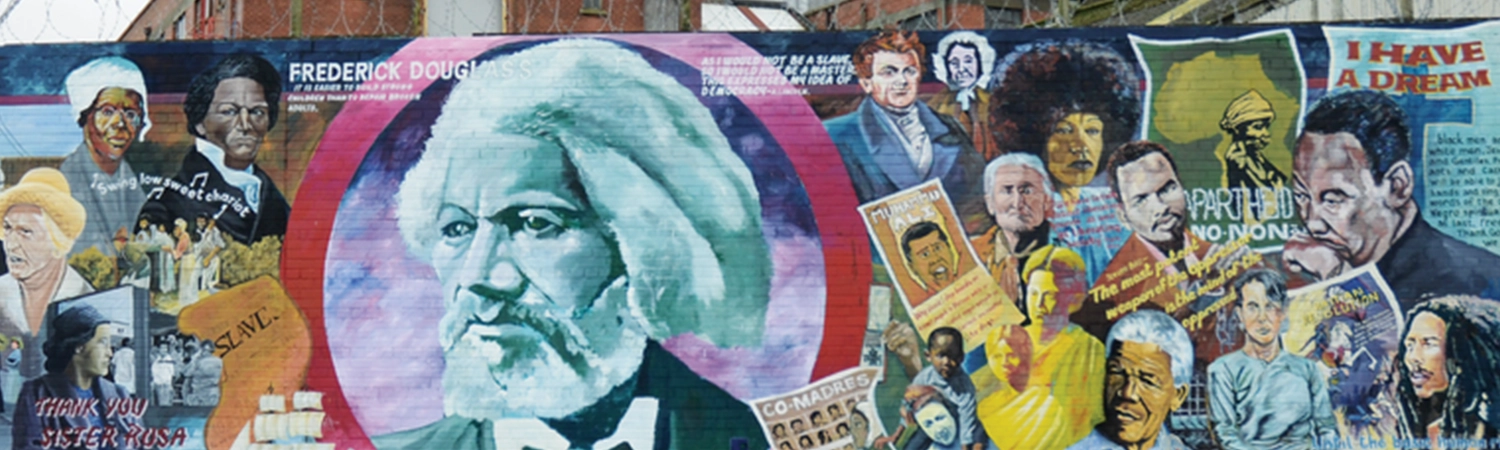 Graffiti mural of peace activists throughout history
