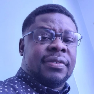 Dr Benjamin Obe