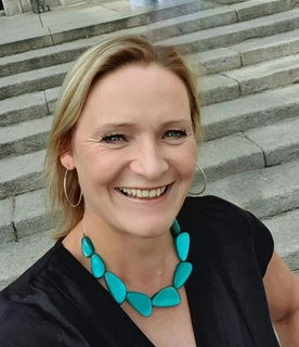 Ms. Catherine Giltrap