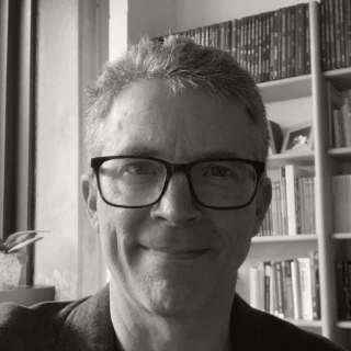 Prof.