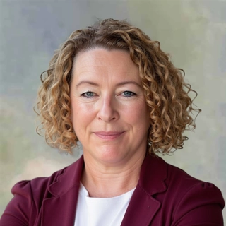 Ms. Gillian Farrell