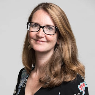 Ms. Estelle Gittins