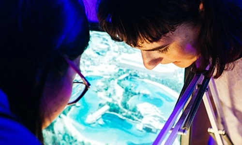 Two students looking at a computer screen