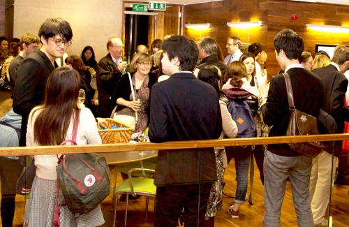 Students attending a reception at Trinity Centre for Asian Studies