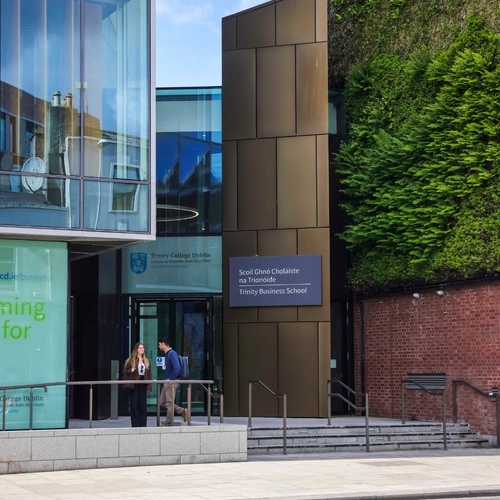 Two Students outside building