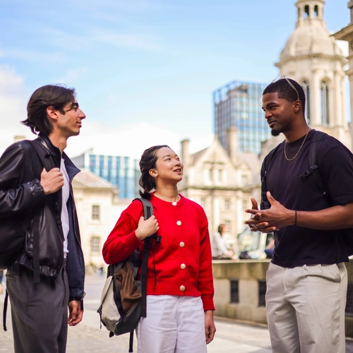 Three students on Front Square