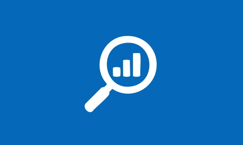 An image of a magnifying glass with a bar chart inside