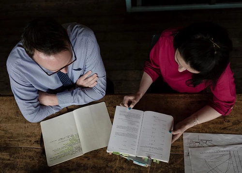 postgraduate students studying