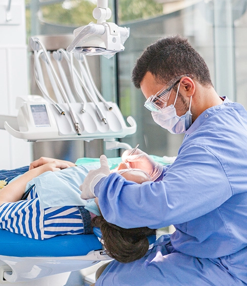 A dentist putting in a filling