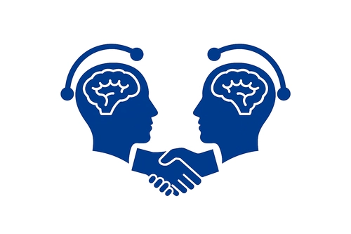An image of two individuals shaking hands