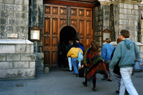 Students walking through Trinity College front gate.