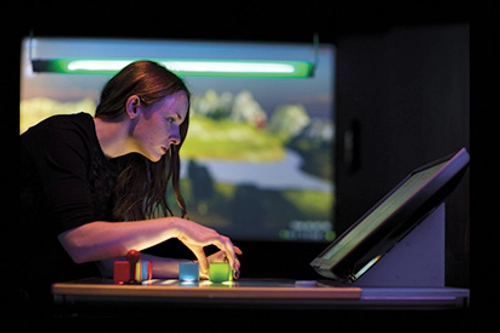 Student reviewing work on computer