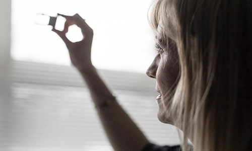 Woman looking at a lab slide