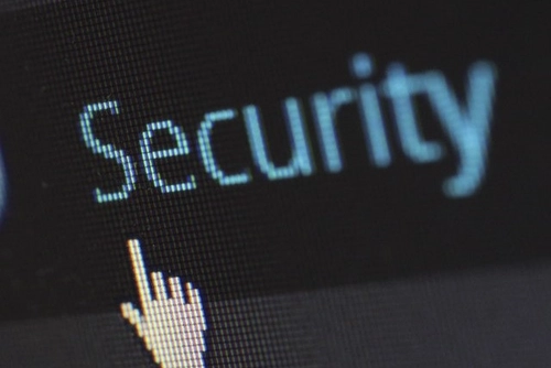 Image of a cursor pointing to Security text on screen