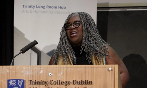 Anthea Butler speaking at a podium for the Annual Humanities Horizons Lecture