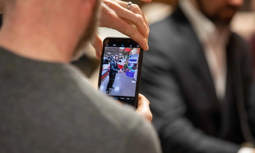 Man watching video on his phone