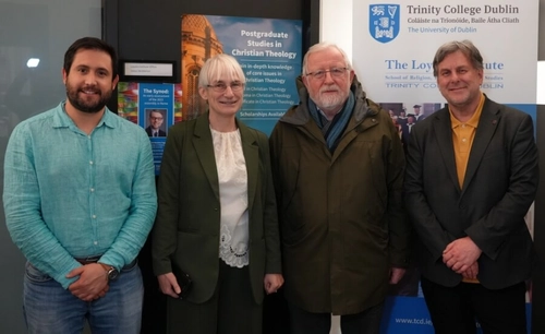 One scholarship attendee and three Loyola personnel