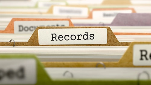 Records folders in a filing cabinet