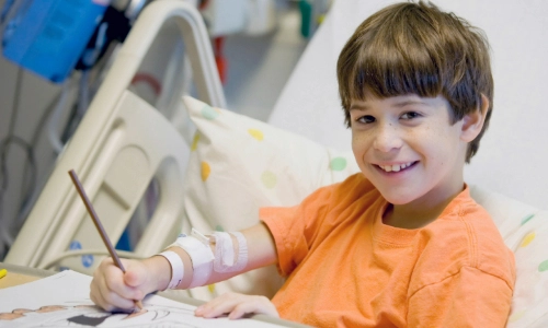 A child in a hospital bed
