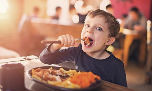 Boy eating a meal