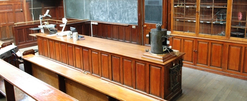 View of the front desk and blackboard at the Physics Lecture Theatre