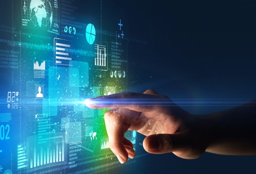 A finger touching a glass touch screen computer