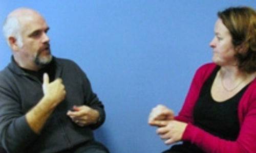 Two people talking