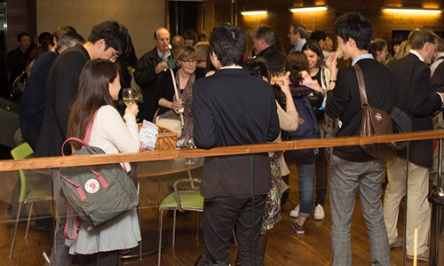 Group of people chatting and laughing