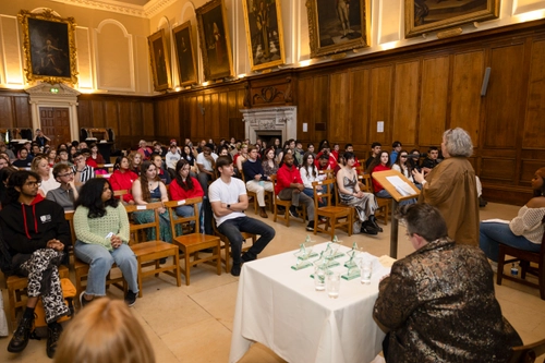 S2S Volunteer Awards 2025. S2S Volunteers are sitting in assembly listening to Provost Linda Doyle.