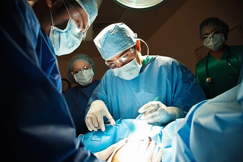 Doctors performing a Caesarian