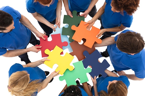 colourful jigsaw pieces fitting together