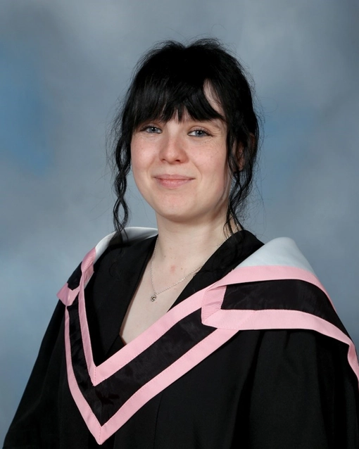 Tara Kerins Aylmer, Ph.D. researcher in graduation photo