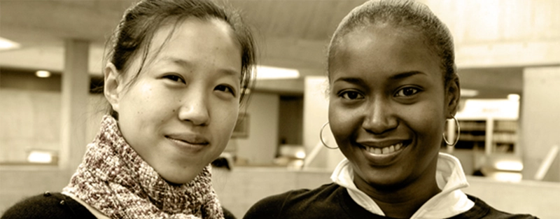 2 students laughing