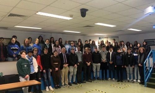 A group photo of 50 Transition Year students in a classroom in the School of Engineering, Trinity College Dublin