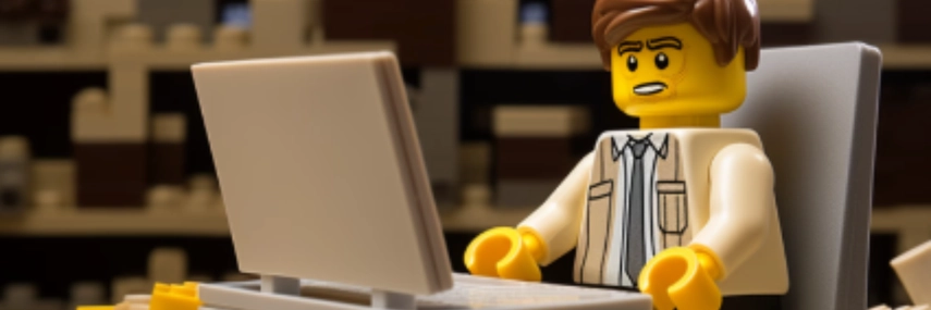 image of a lego man learning a new skill on computer