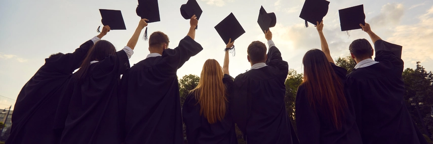 images of university students in cap and gown