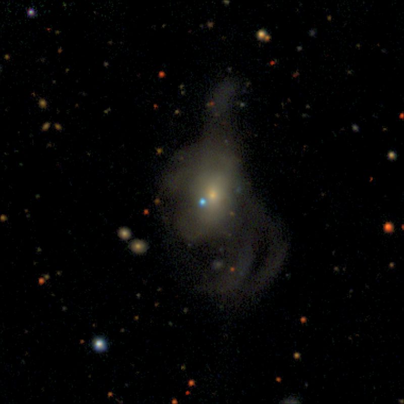 Zwicky Transient Facility composite image of supernova (SN) 2019yvq (blue dot in the center of the image) in the host galaxy NGC 4441 (large yellow galaxy in the center of the image), which is nearly 140 million light-years away from Earth. SN 2019yvq exhibited a rarely observed ultraviolet flash in the days after the star exploded. Credit: ZTF/A. A. Miller (Northwestern) and D. Goldstein (Calte