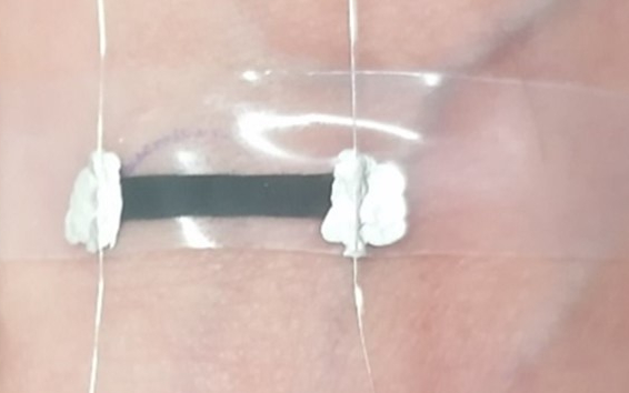 They developed a method to formulate G putty-based inks that can be printed as a thin-film onto elastic substrates, including band-aids, and attached easily to the skin.