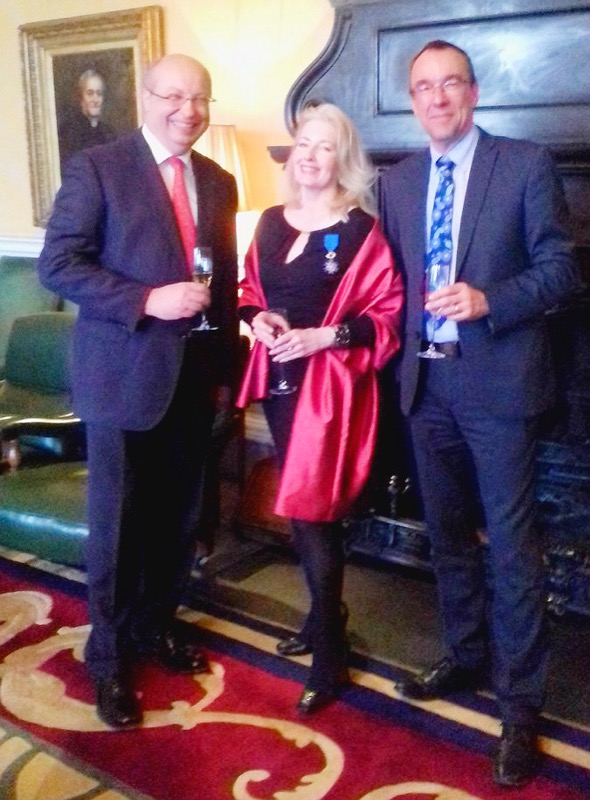 Professor Sarah Alyn-Stacey after being named a Knight of the National Order of Merit.